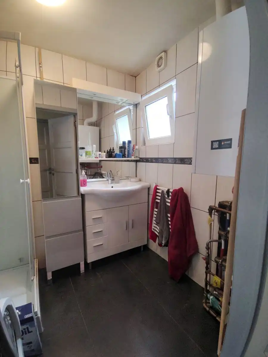 Opbrengsteigendom met handelspand & 2 appartementen foto 7