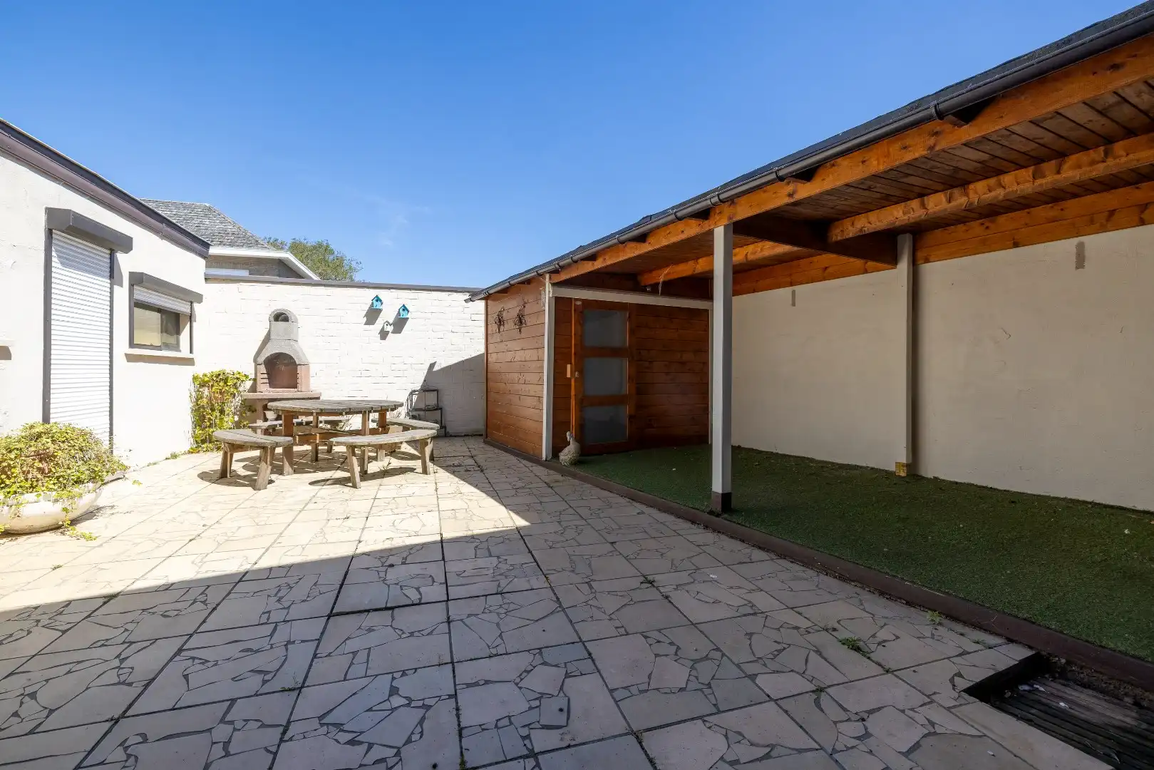 Leuke woning met 4 slk, grote garage en groot binnenterras foto 16