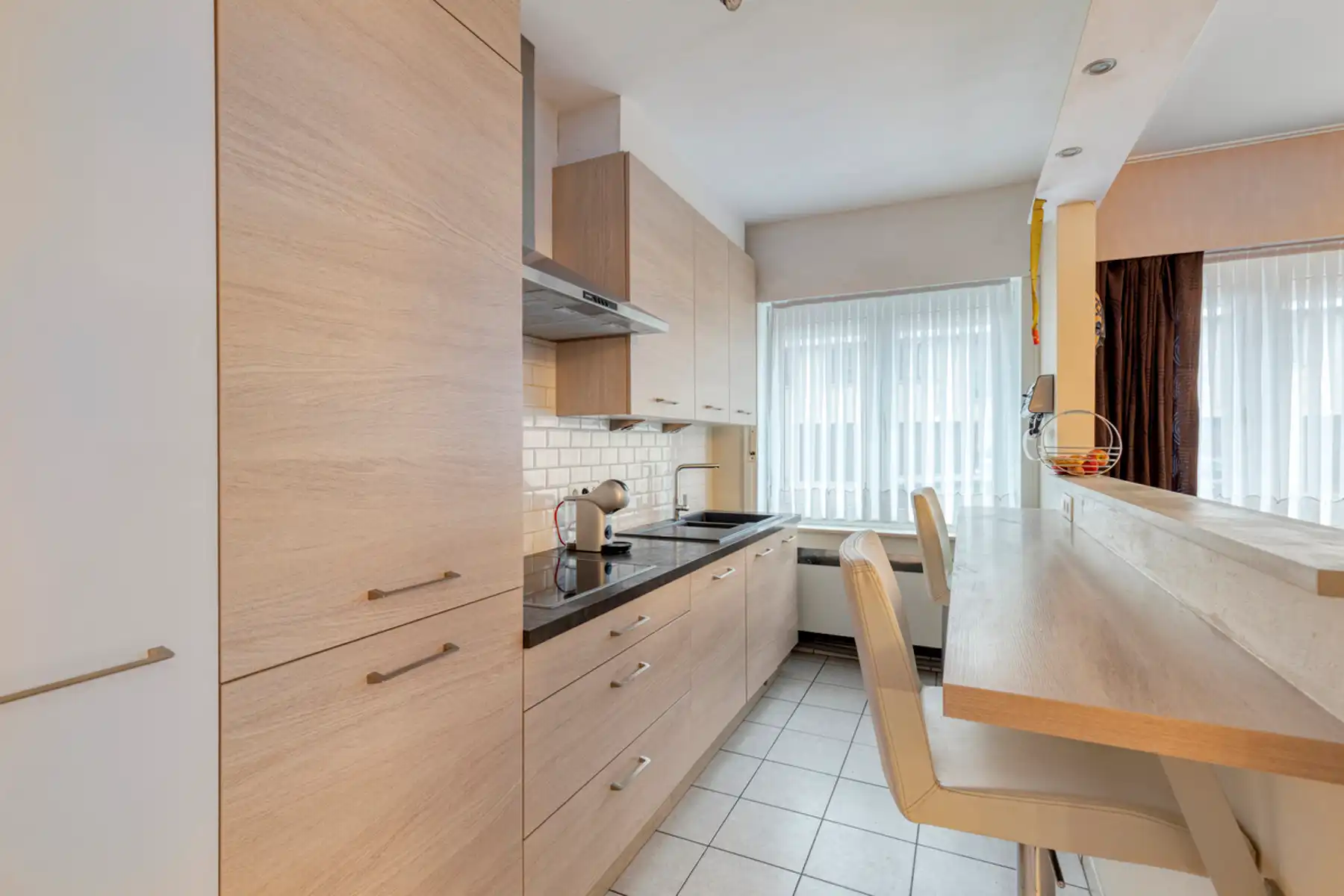 Leemans Immobiliën biedt u dit instapklare gelijkvloers appartement aan, gelegen op een uitstekende centrale locatie in het hart van Zellik foto 8