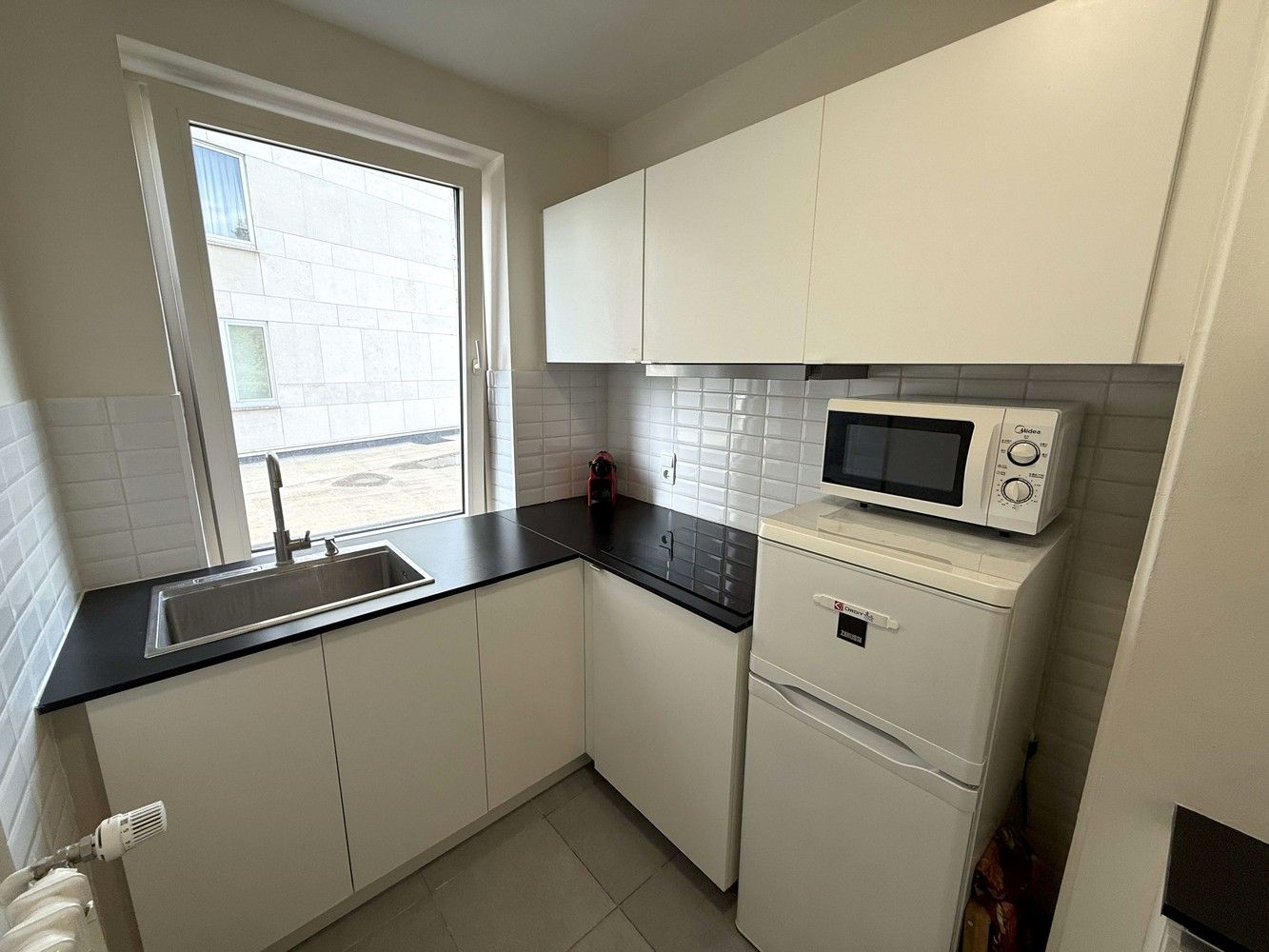 Licht en ruim 2-slaapkamerappartement met terras in hartje Leuven foto 7