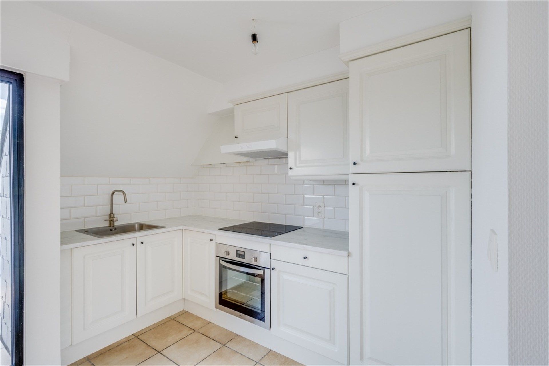 Ruim appartement met twee slaapkamers en staanplaats foto {{pictureIndex}}