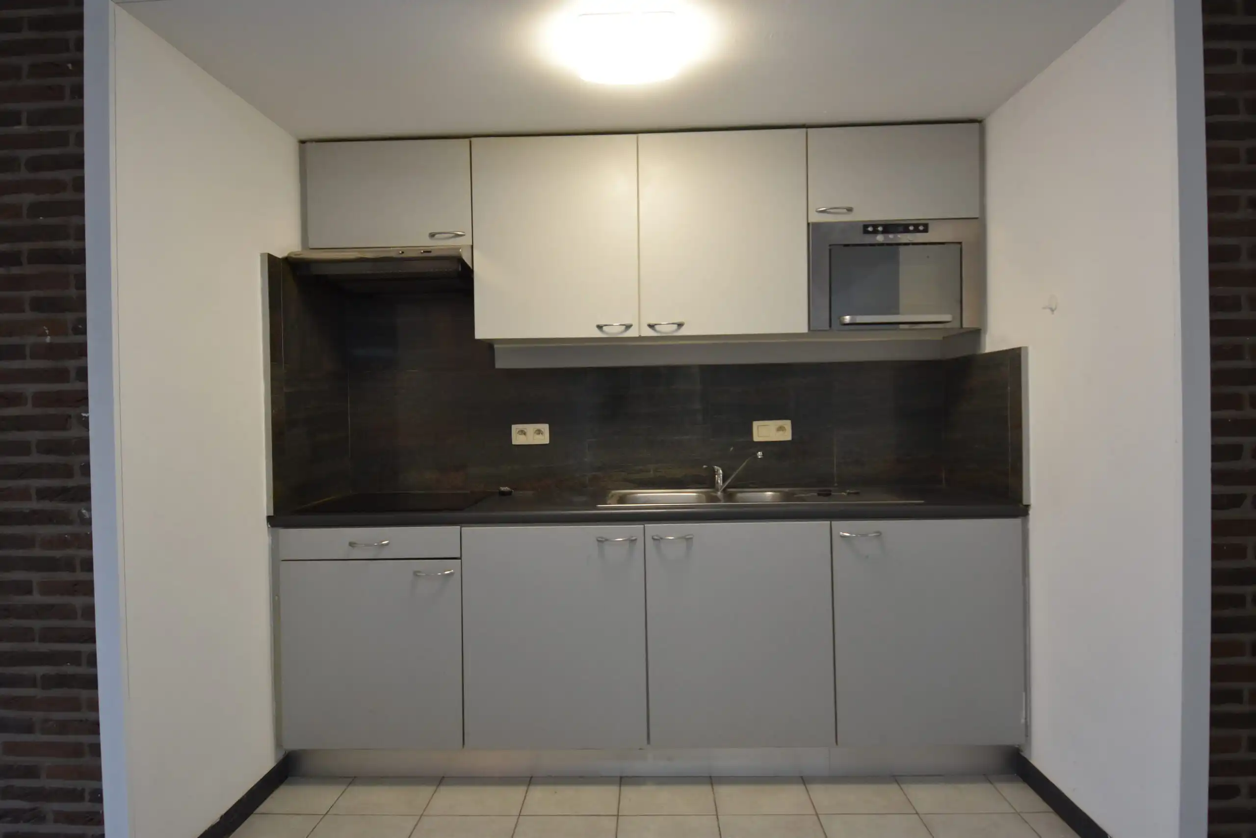 Instapklaar gelijkvloers appartement te huur in hartje Nieuwkerken foto 5