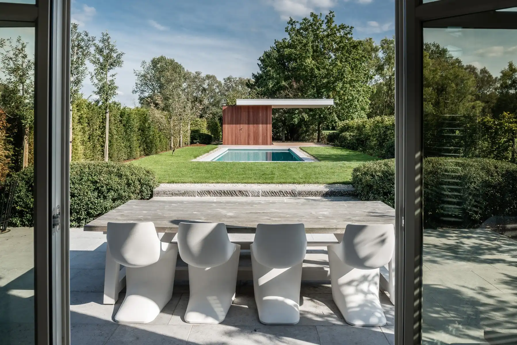 Exclusieve instapklare woning met zwembad en open groenzicht foto 22