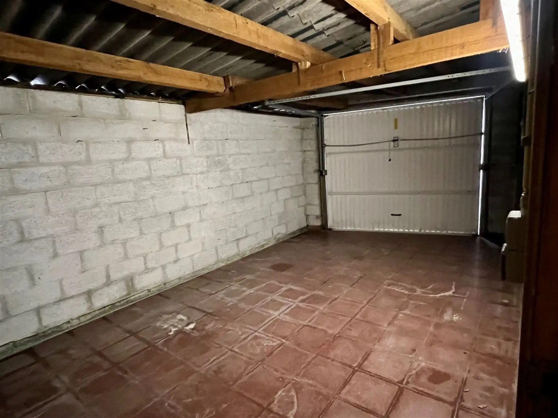 Veelzijdig en ruim commercieel pand met woonst foto 10