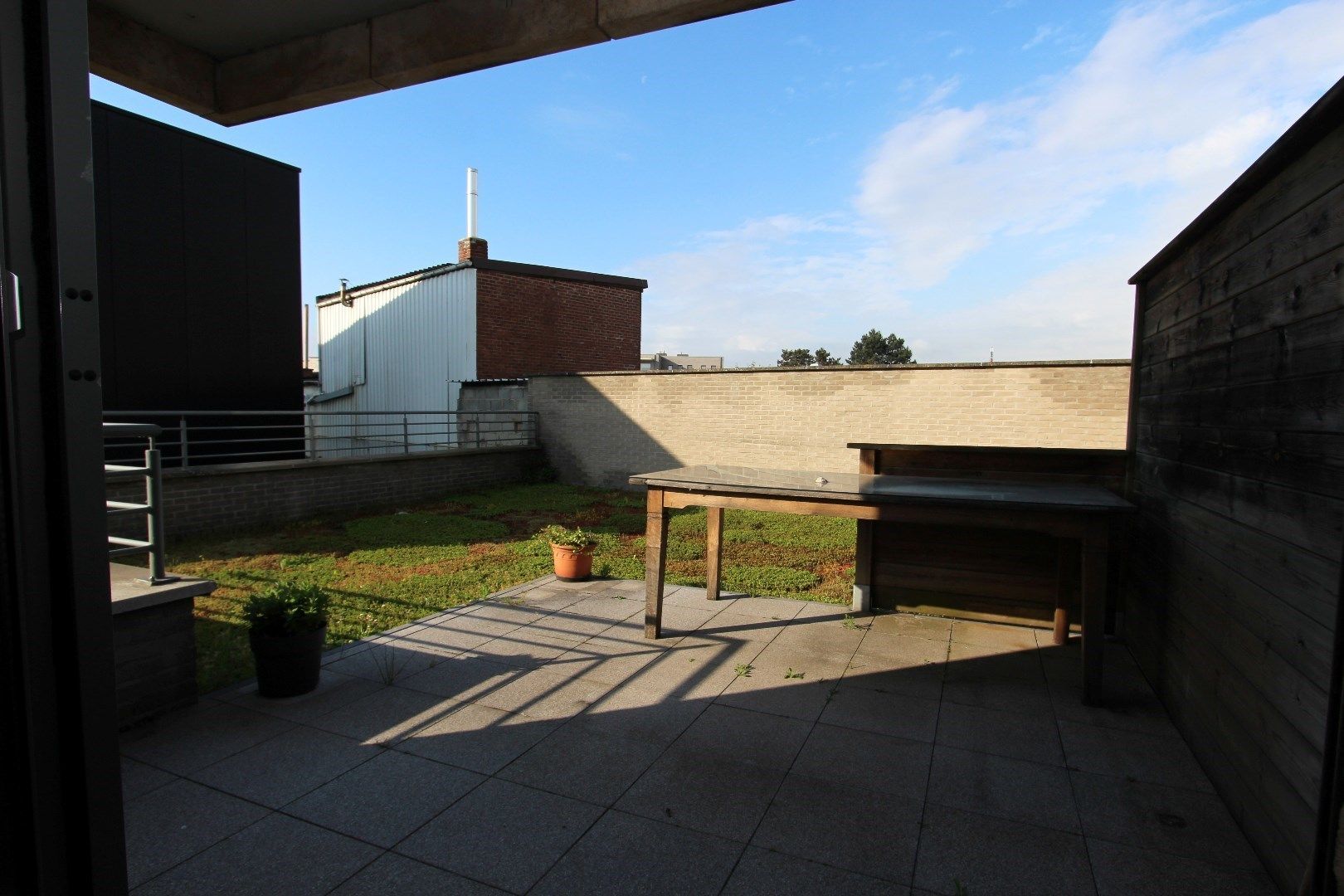 Gelijkvloers appartement met ruim zonneterras en garage - centrum Tongeren foto 5