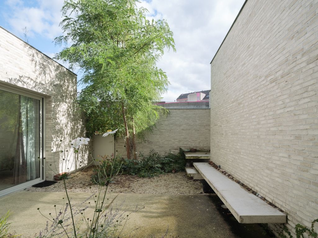 Architecturaal gelijkvloers appartement met bijzondere ruimtelijkheden, 1 slaapkamer en aangename stadstuin - Centrum Gent. foto 10