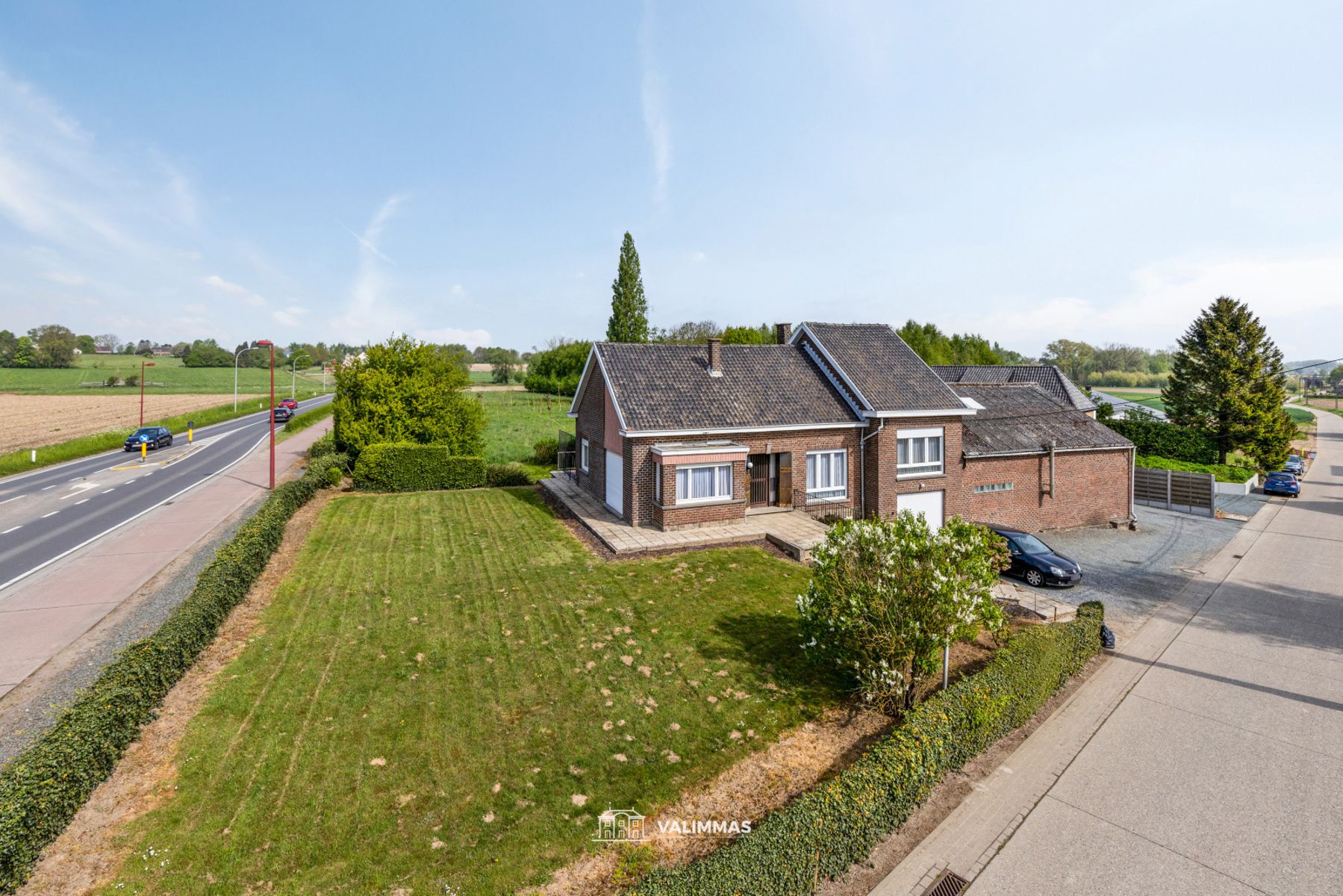 Ruime alleenstaande woning op ± 22 are, met atelier en tuin foto 4