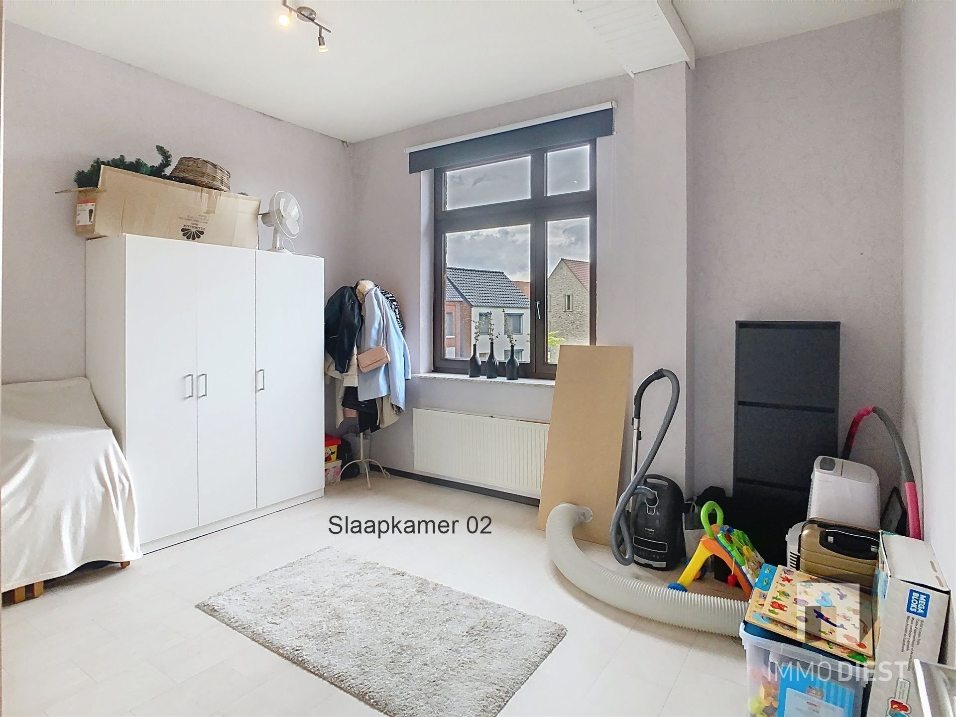 Appartementsgebouw van 2 appartementen en  3 garageboxen foto 18
