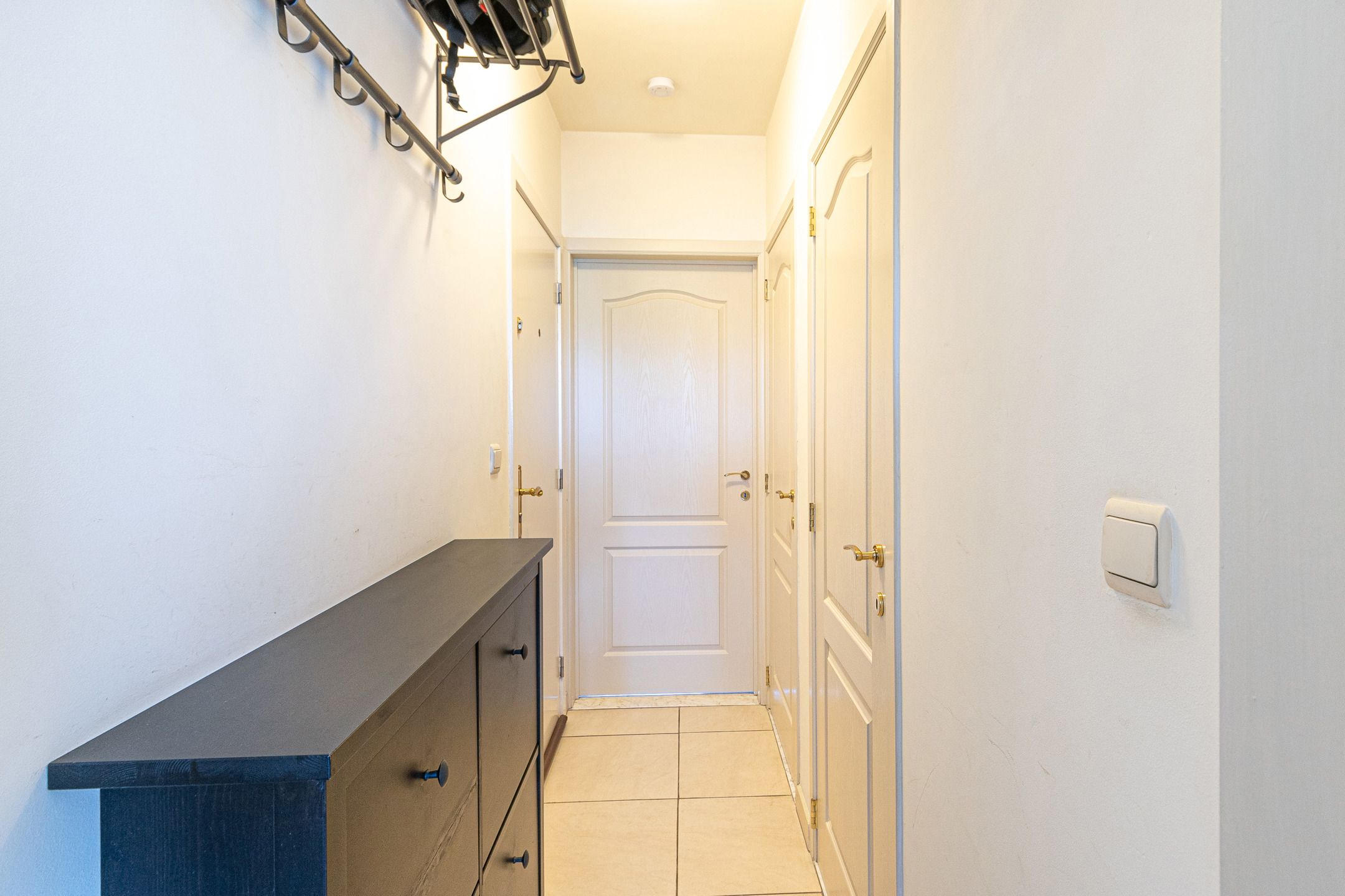 Instapklaar 1-slaapkamerappartement met garage foto 17