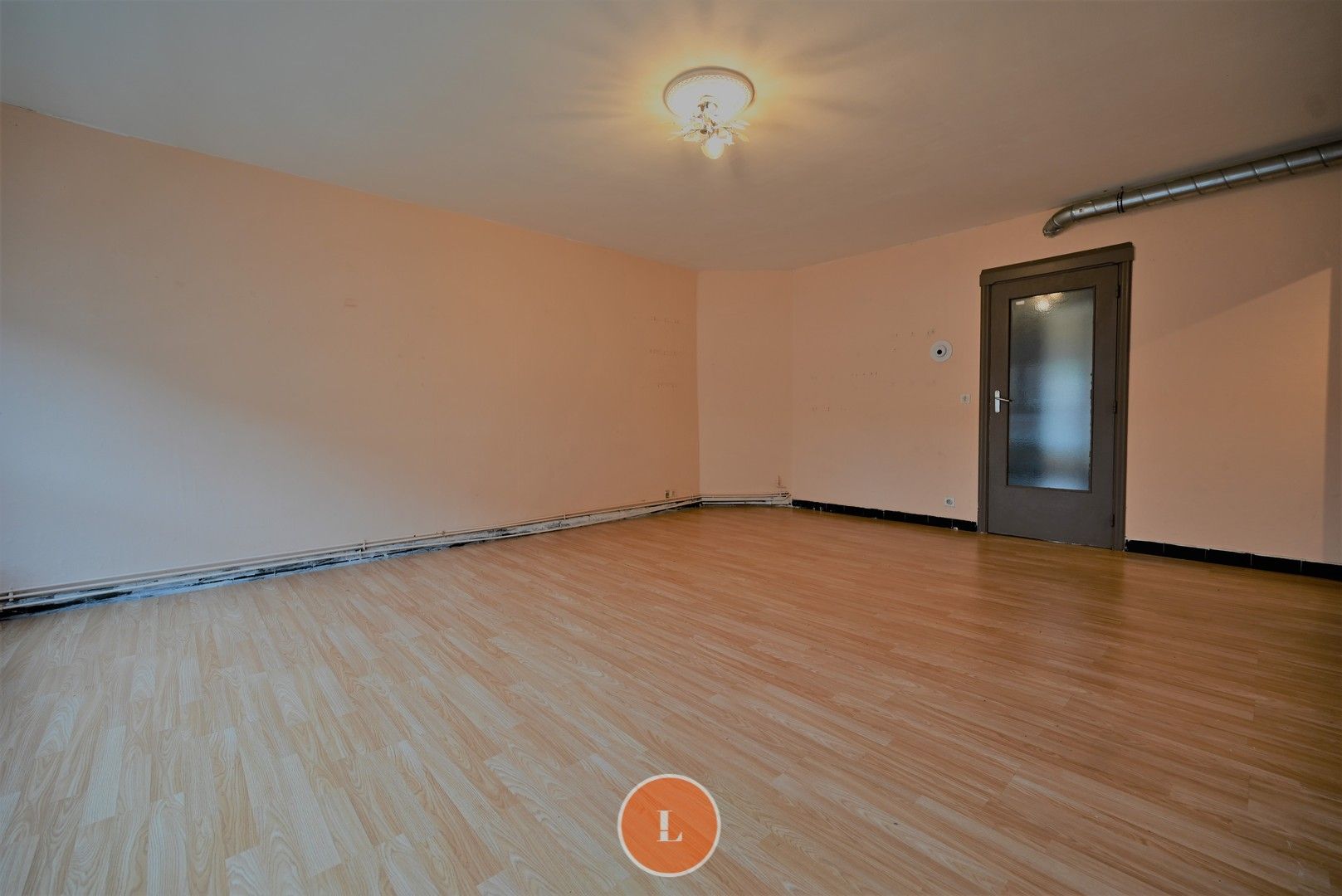 Opbrengsteigendom met 2 appartementen en 2 garages foto 2