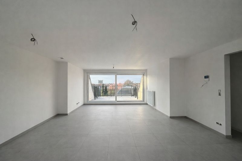 Appartement op het tweede verdiep met ruim terras voor- en achteraan. foto 6