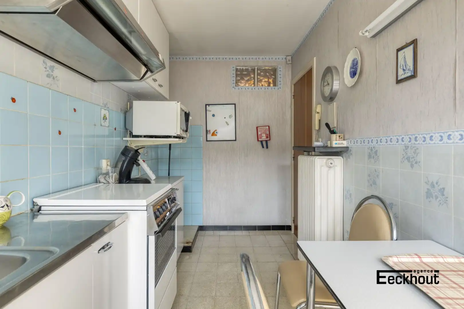 Te moderniseren woning op goede ligging met garage en tuin! foto 11