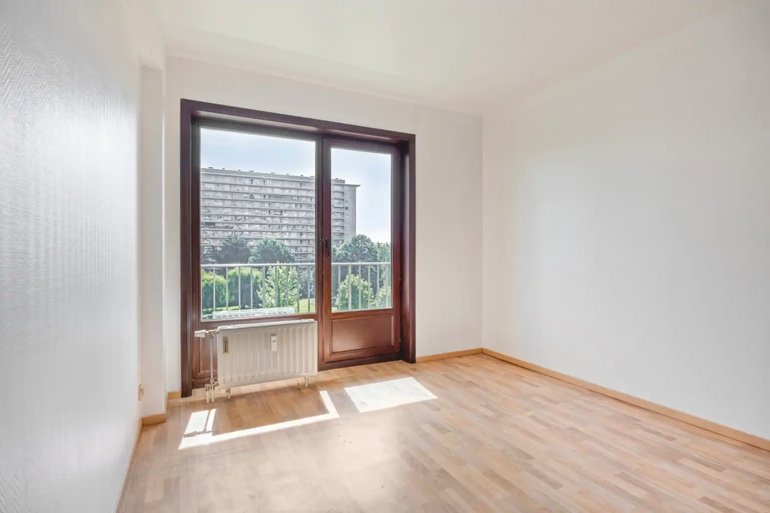 Ruim 3-slaapkamerappartement met garage op toplocatie foto 12