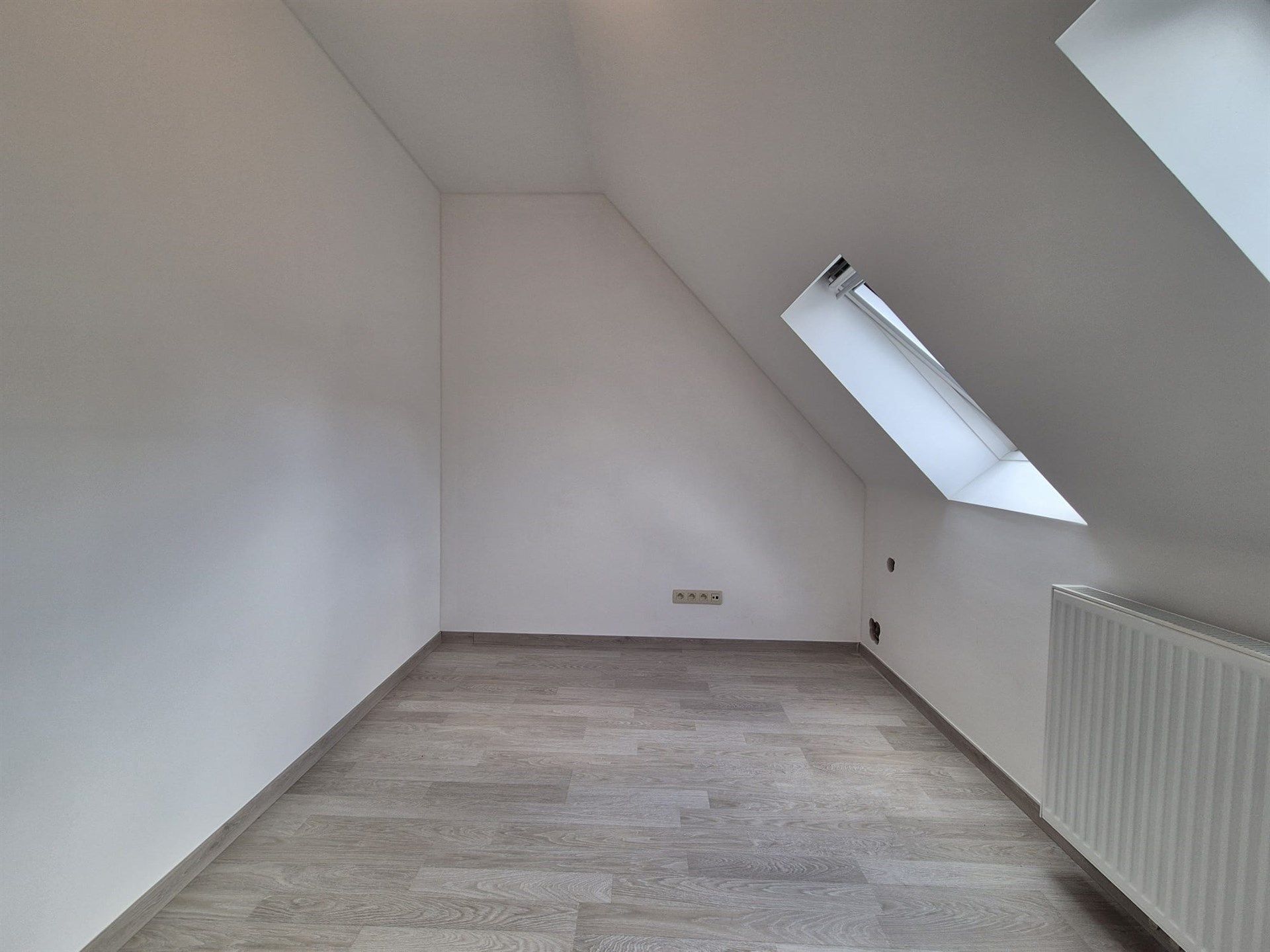 Zeer energiezuinige woning met 2 slaapkamers en tuin. foto 21