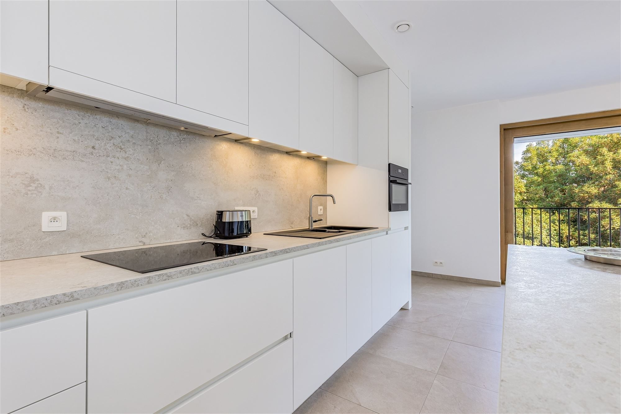 Energiezuinig appartement met 2 slaapkamers, terras en parkeerplaats foto 2