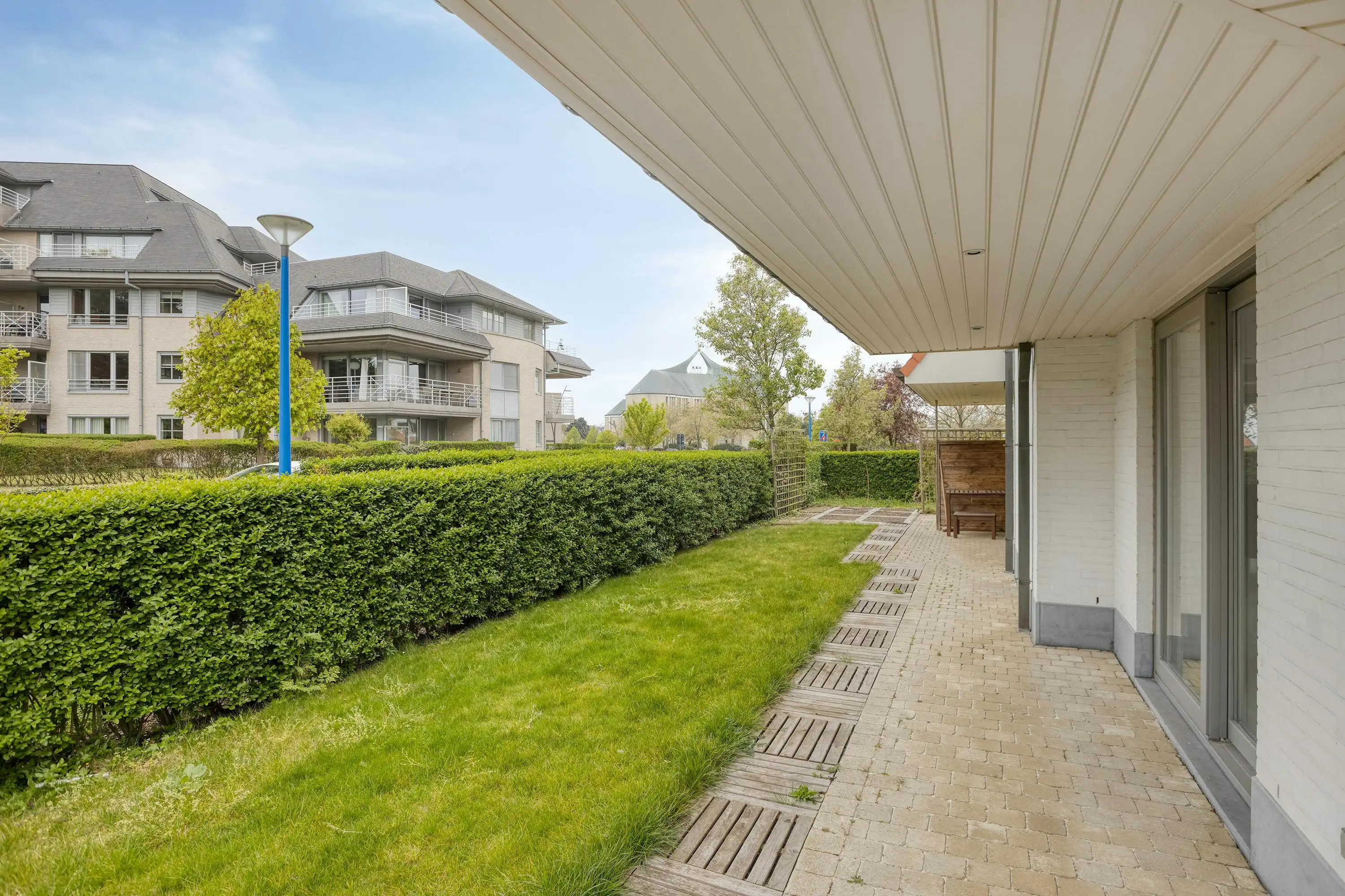 Gelijkvloers appartement (110m²) met tuin op topligging! foto 11