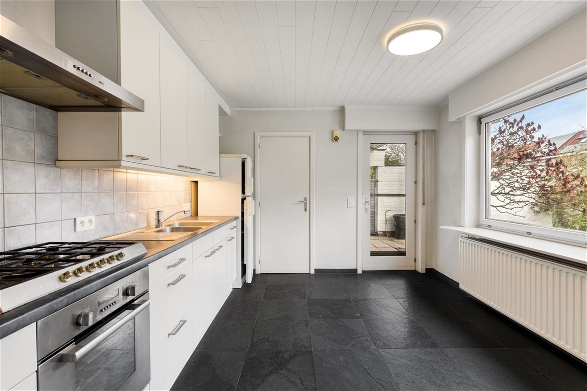 Moderne, zéér praktische woning met leuke tuin! 3 Slpks. foto 8