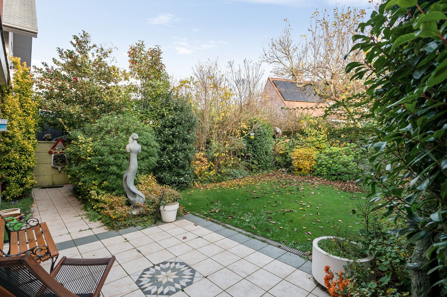 Karaktervolle halfopen woning met garage, oprit en gezellige tuin nabij het centrum van Borsbeek! foto 23