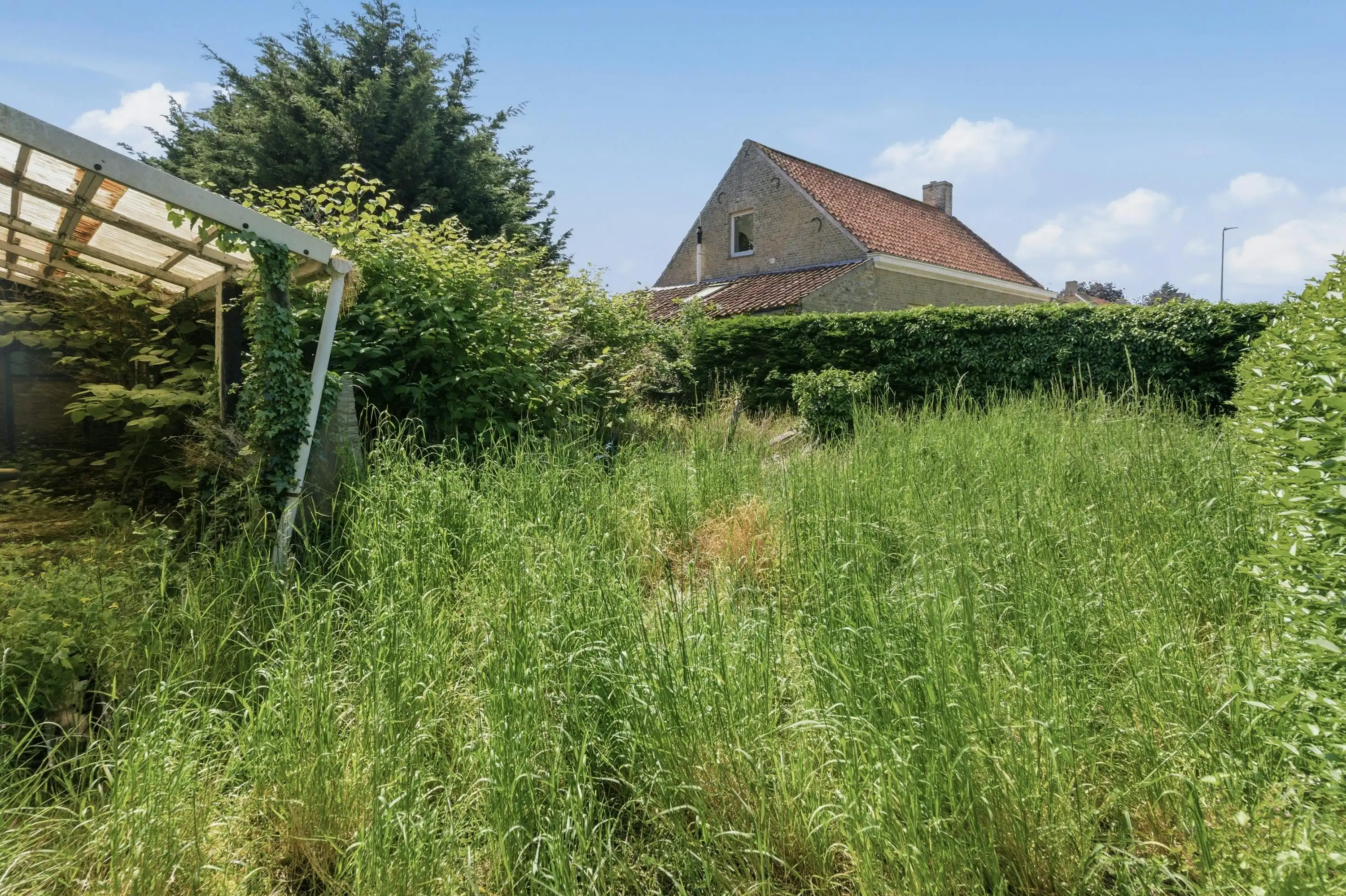 Karaktervolle renovatiewoning met veel potentieel in Beauvoorde. foto 14