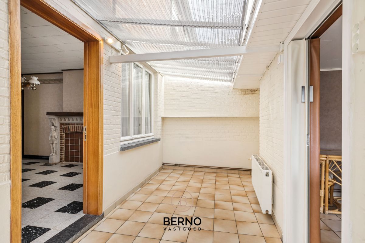 Centraal gelegen woning met tuin en garage. foto 6