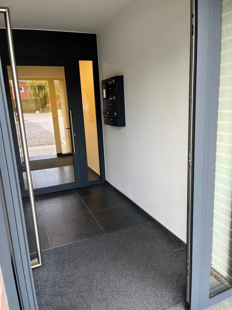 Modern gelijkvloers 1 slaapkamer appartement met ruim terras en ondergrondse parking in As! foto 2