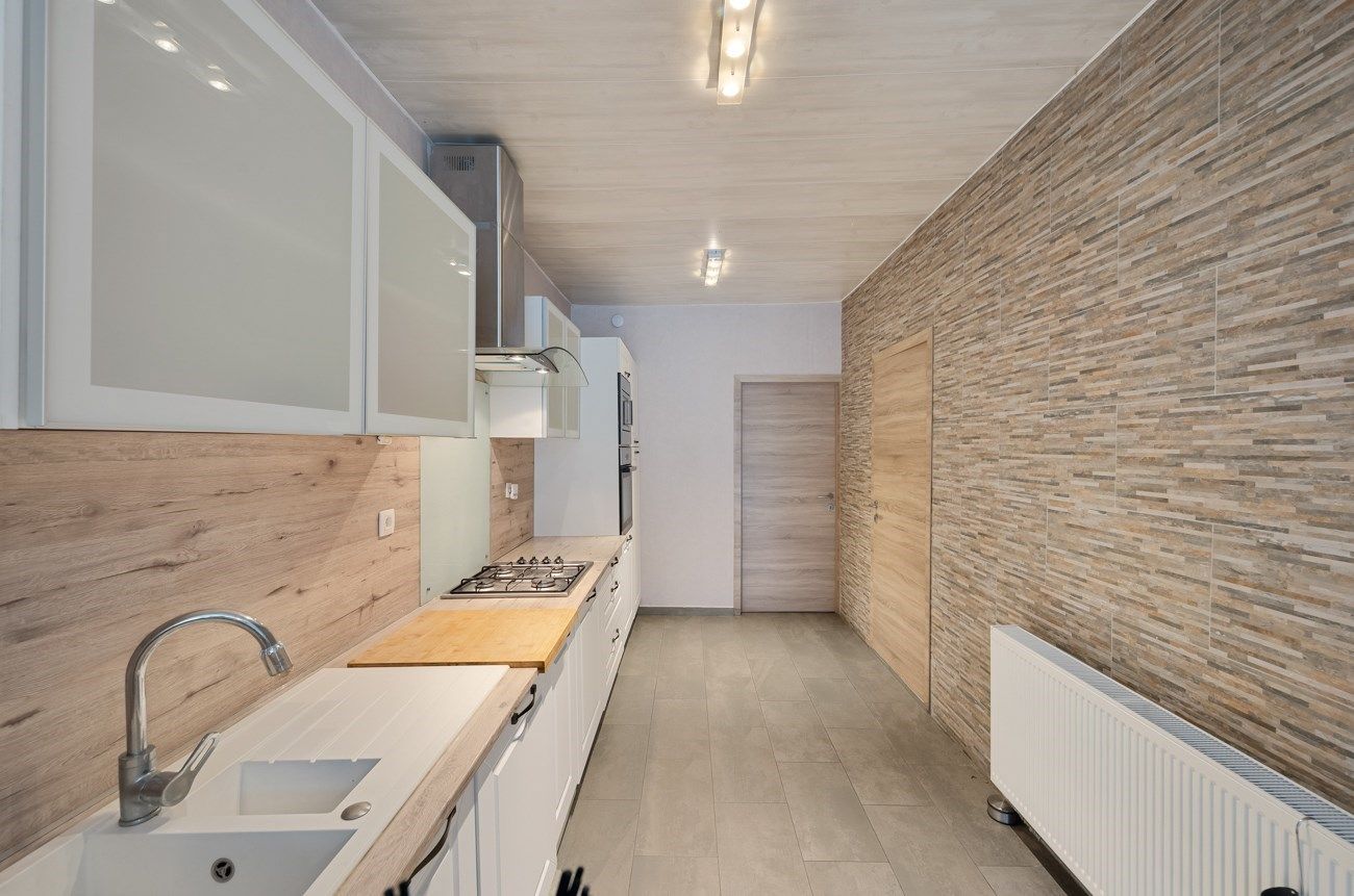 Ruime woning met tuintje en terras. foto 4