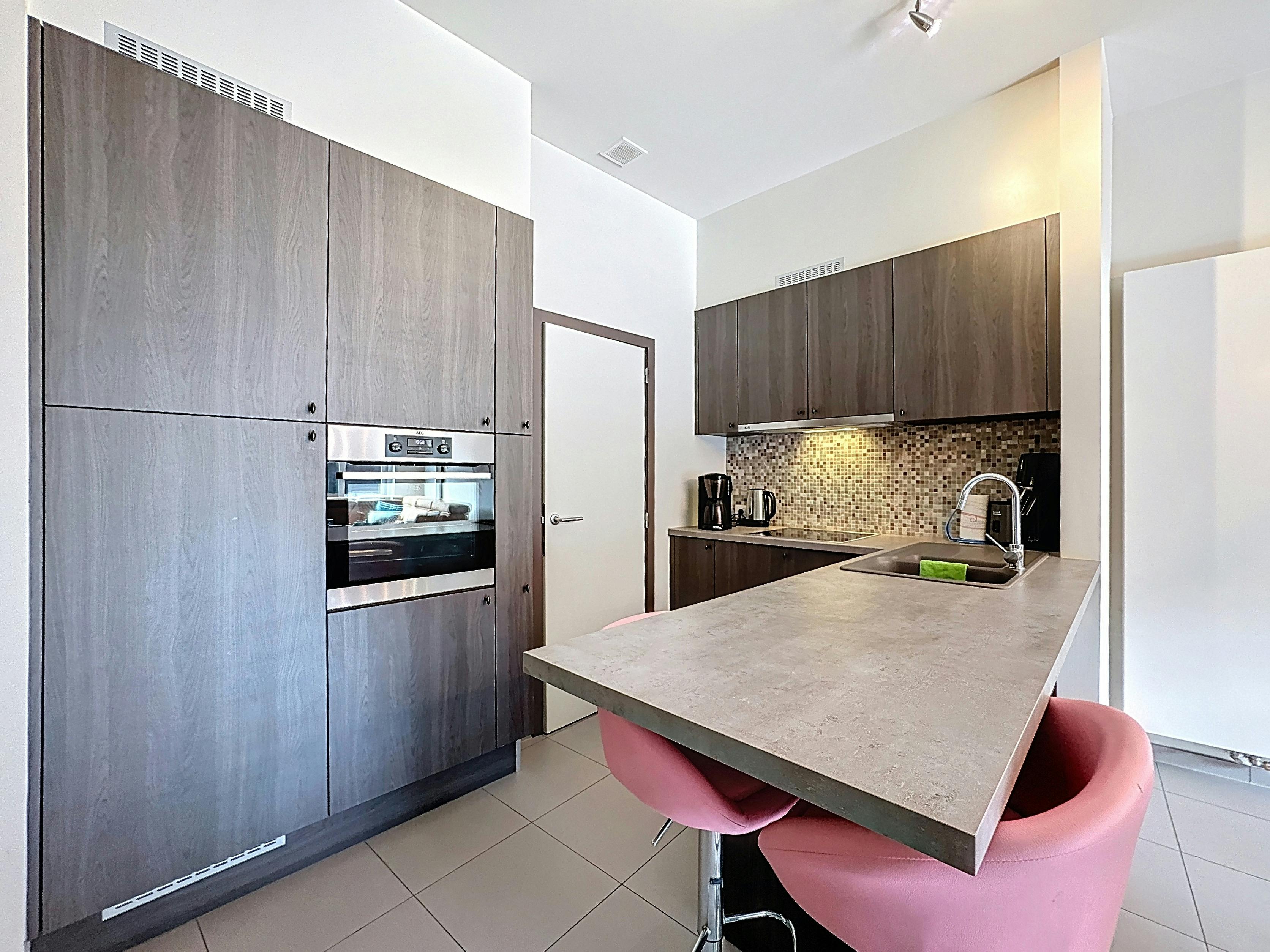 Recent appartement met zonnige tuin te koop in centrum Heist foto 8