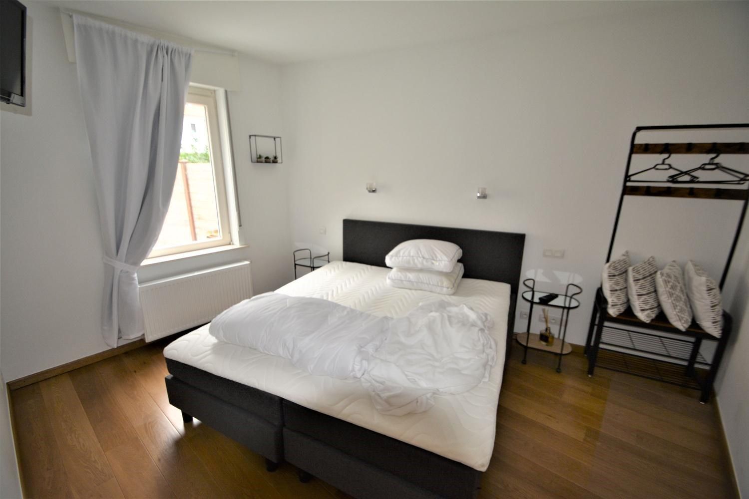 Ruime kangoeroewoning met tuin, terras en garage in Knokke, bouwjaar 1963, 3 slaapkamers, EPC-waarde 183.00, 2 badkamers, perceeloppervlakte 125.00, bewoonbare  foto 13