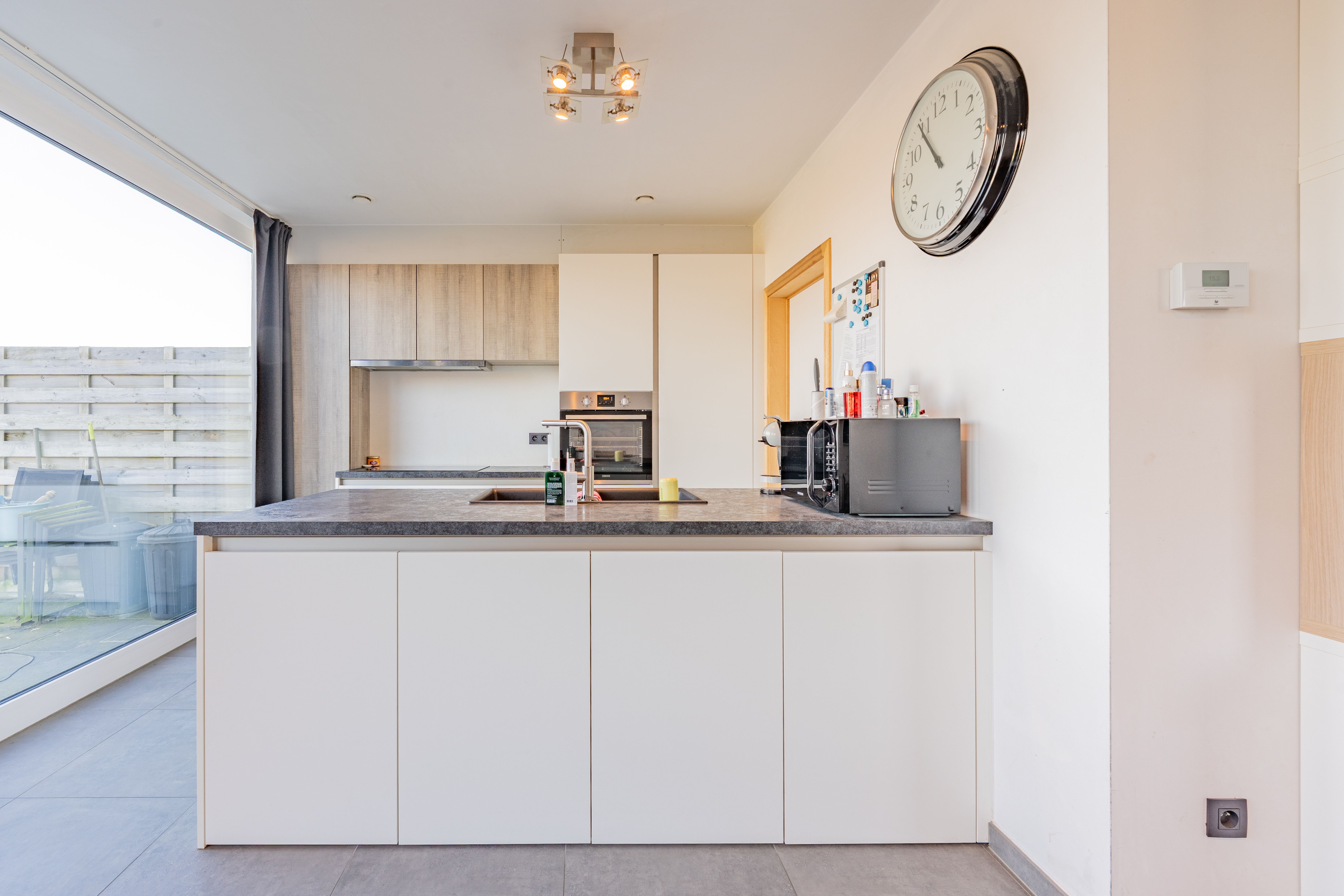 Halfopen bebouwing met inpandige garage en ruime tuin foto 5