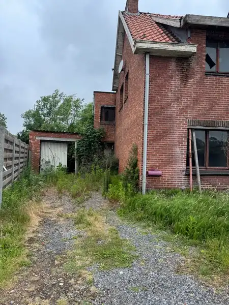 Bouwgrond met af te breken woning - 440 m² foto 6