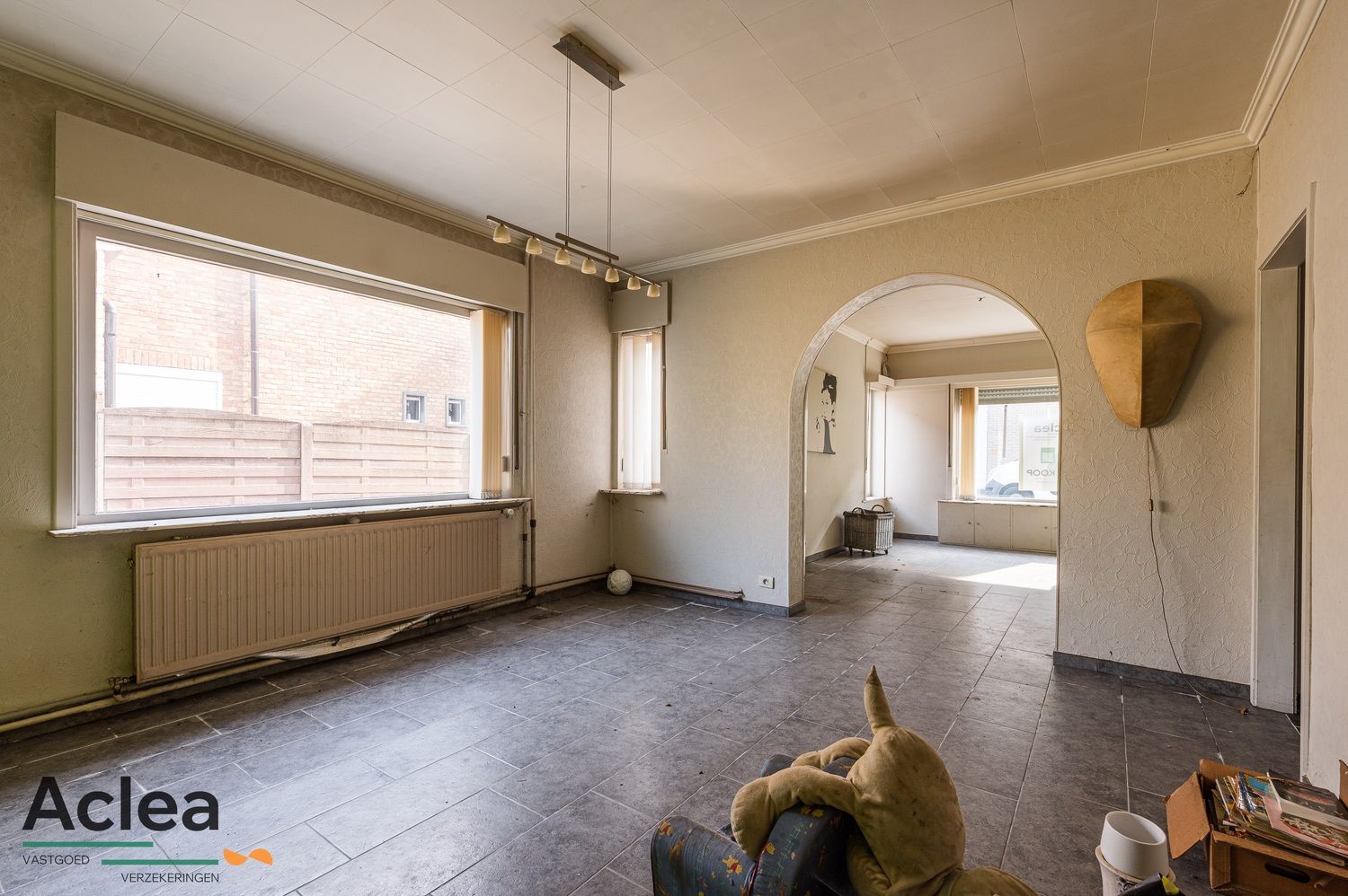 Te renoveren woning met grote magazijnruimte en veel potentieel foto 11