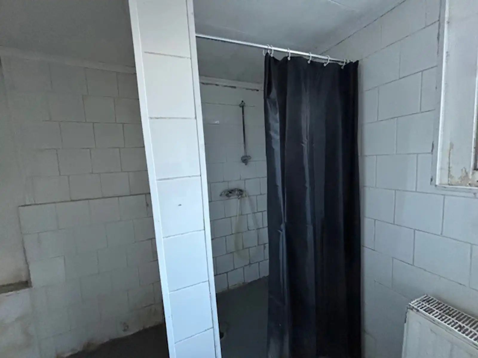 Rijwoning met zij- en achteringang te Gingelom foto 10