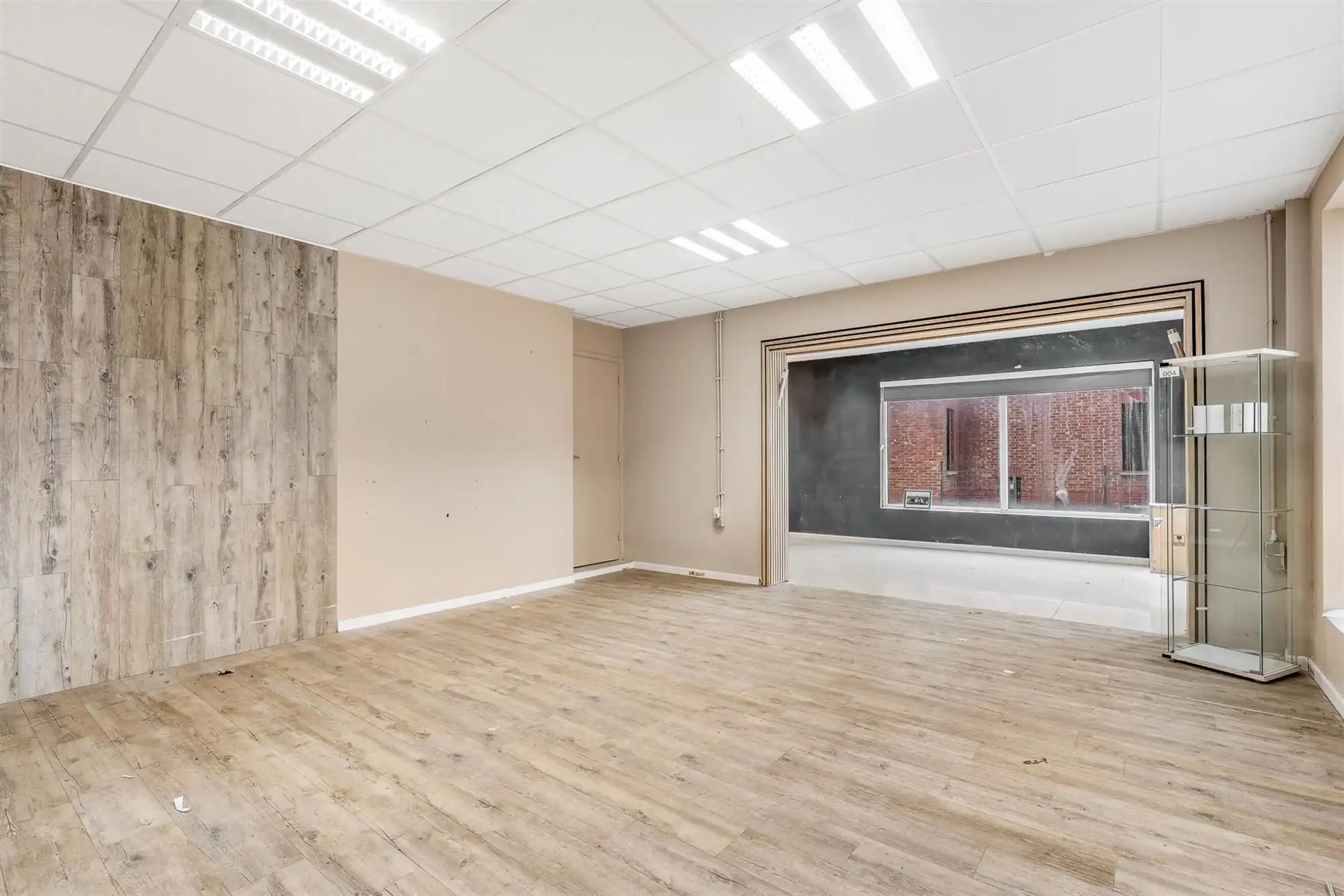 HANDELSHUIS MET RUIM HANDELSPAND EN 2 WOONENTITEITEN OP PERCEEL VAN 9A68CA TE KOERSEL foto 4