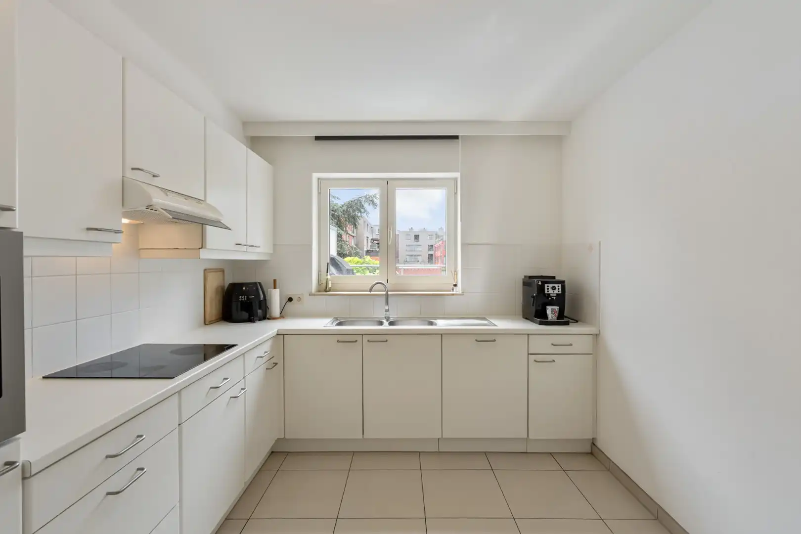 Te koop: Lichtrijk en goed onderhouden 2-slaapkamerappartement met ruim terras en garage in centrum Leopoldsburg foto 6