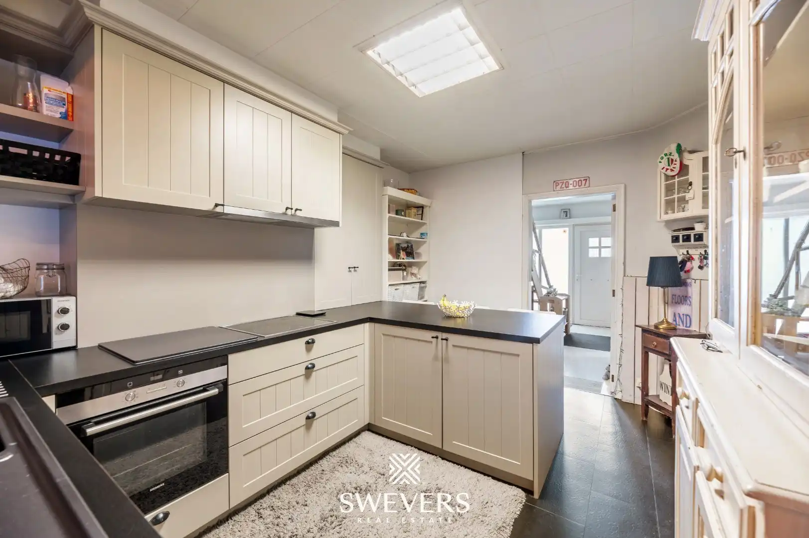 Gezinswoning met vier slaapkamers op ruim perceel in groene omgeving van Heusden-Zolder foto 9