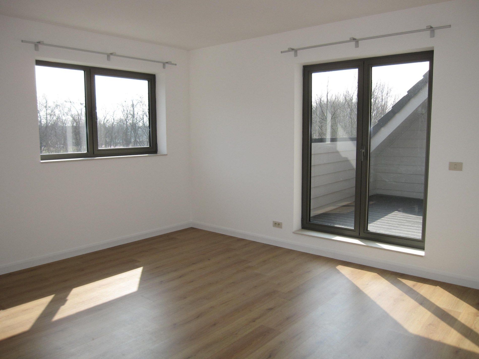 Ruim duplex-appartement met ondergrondse staanplaats en berging foto 5