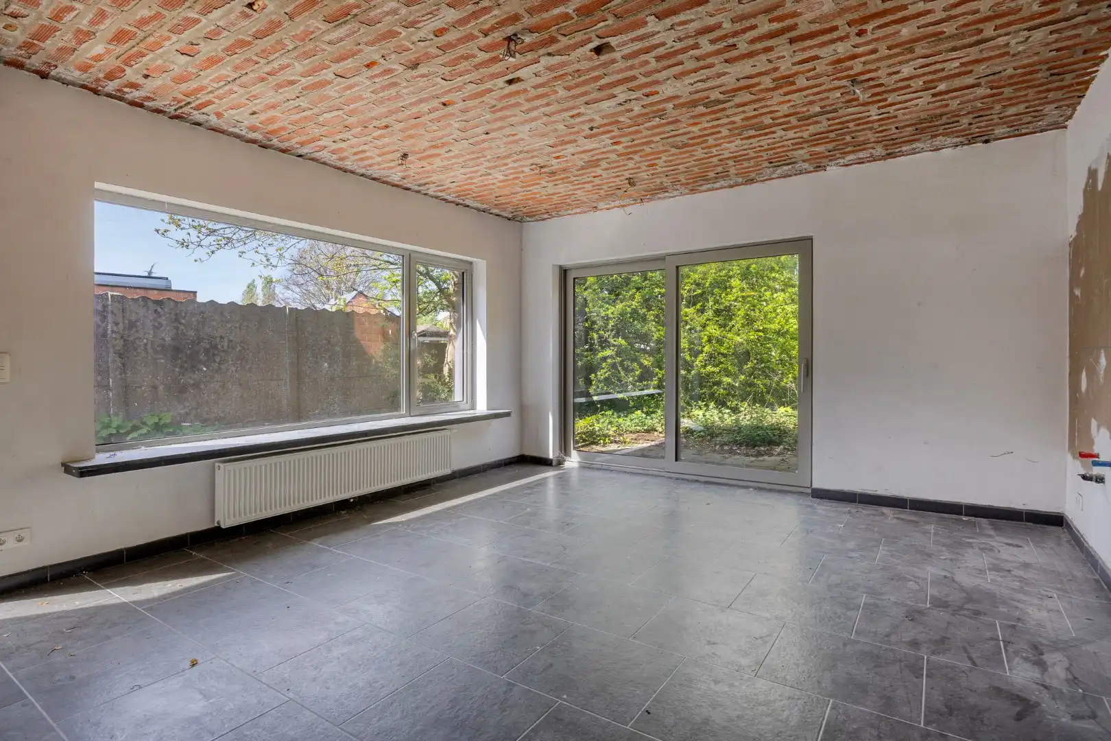 Commercieel gelegen handelspand met appartement met 3 slaapkamers en leuke stadstuin ! foto 9