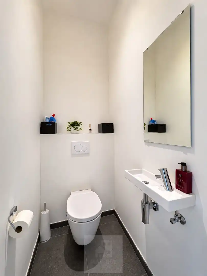 Recent gelijkvloers 2-slaapkamerappartement met tuin aan de Leieboorden foto 10