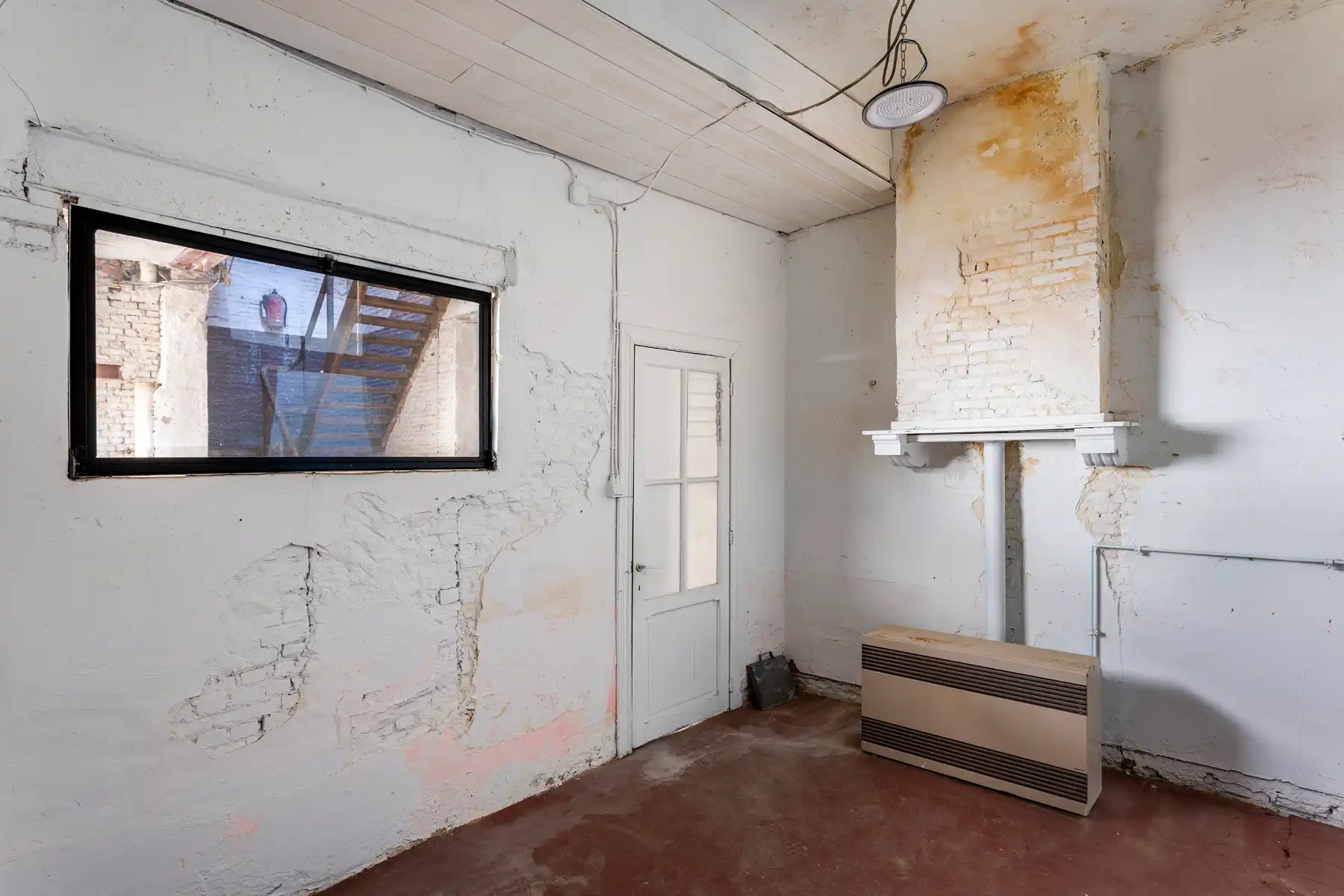 Te renoveren dubbele herenwoning met magazijn op 't Zuid foto 8