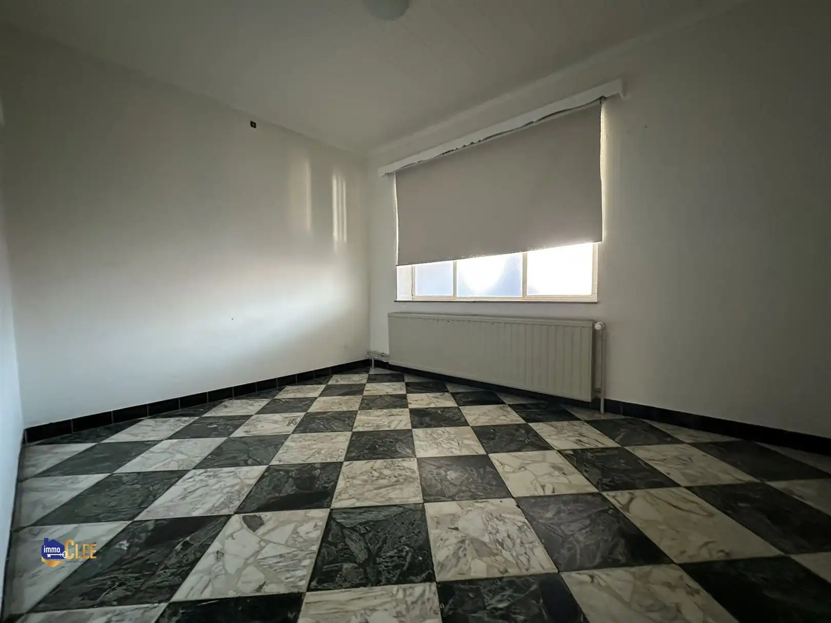 Ruime stadswoning met grote opslagruimte foto 16