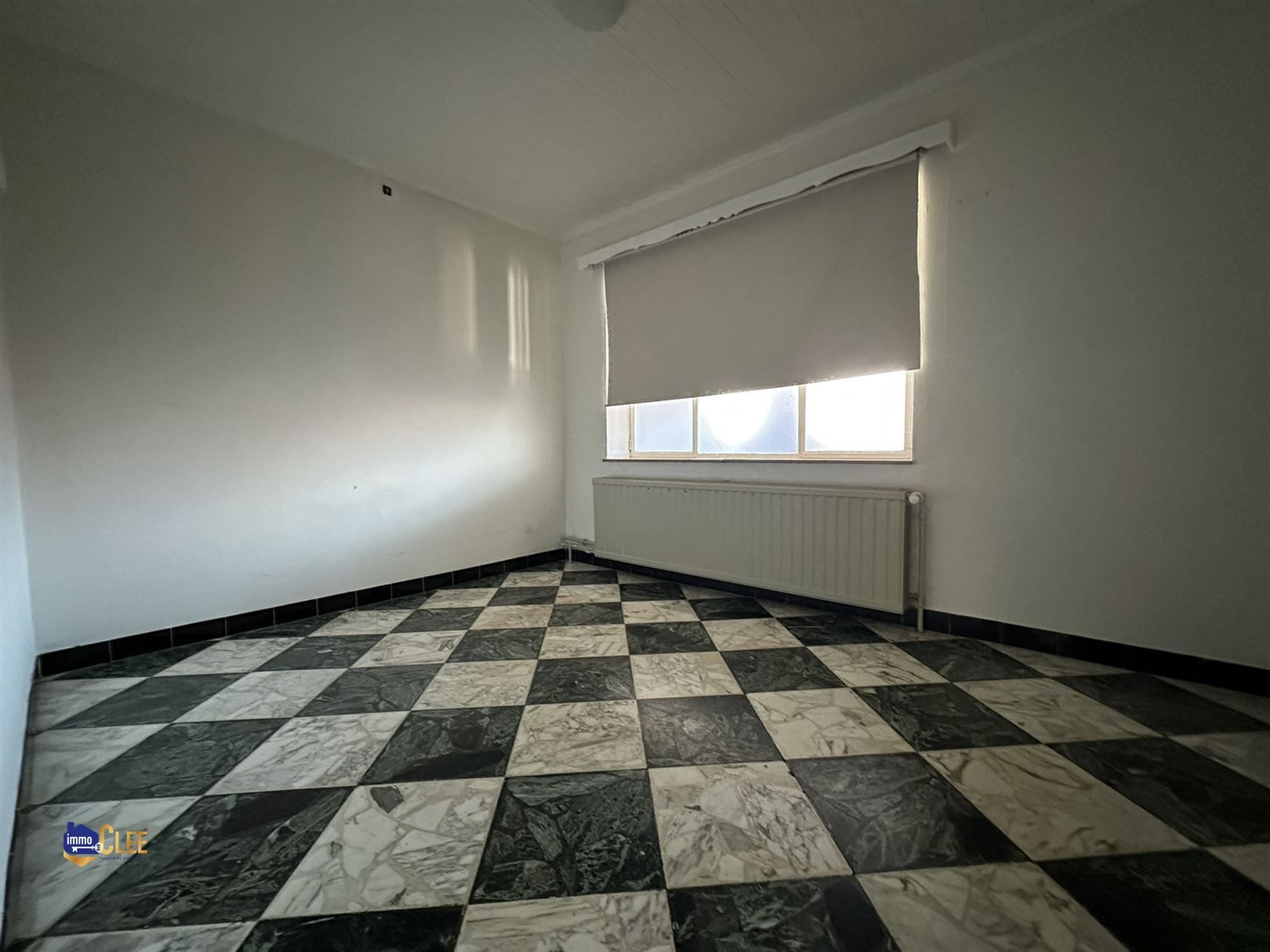 Ruime stadswoning met grote opslagruimte foto 16