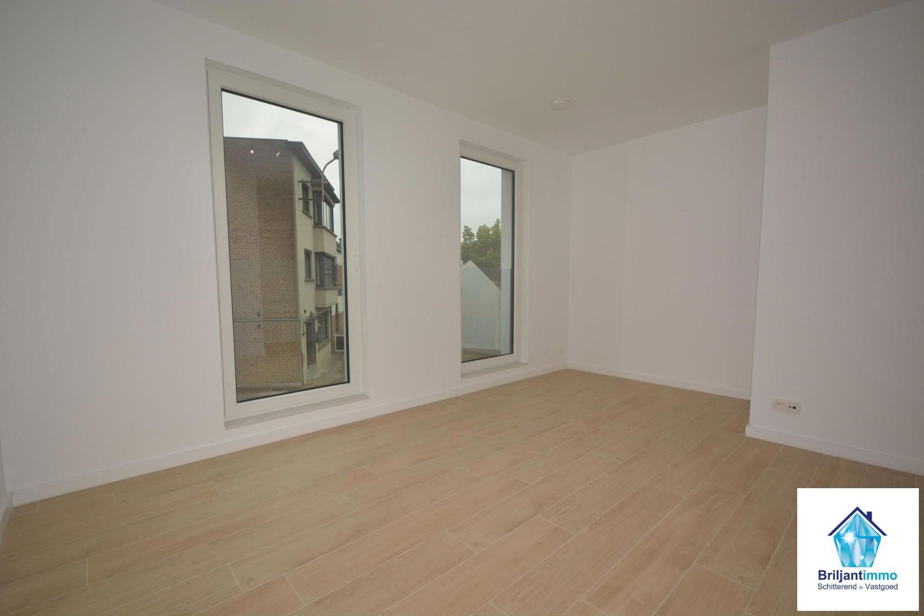 Ongelooflijk tof BEN appartement incl staanplaats en terras foto 9