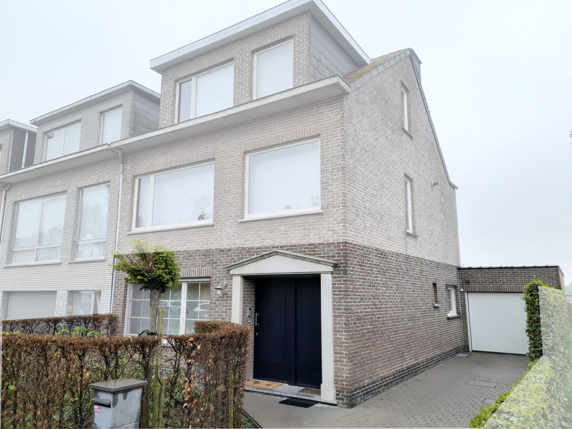 Prachtig 2-slpk-appartement met garage, terras en tuin  foto {{pictureIndex}}