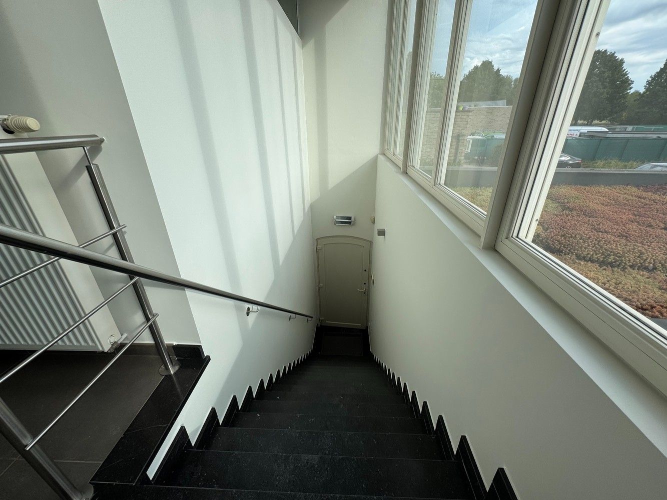 TE HUUR: Ruim Duplex-appartement met 4 staanplaatsen in Diepenbeek foto 12