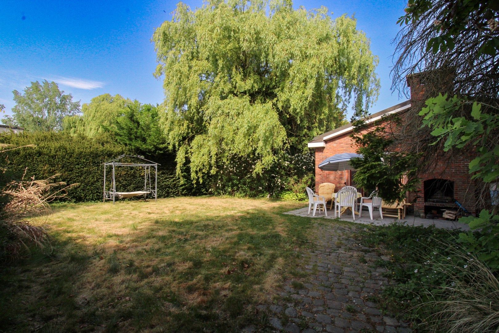 Luxe, ruimte en ontspanning onder één dak – exclusieve villa met zwembad en tennisveld te koop in Beveren! foto 38