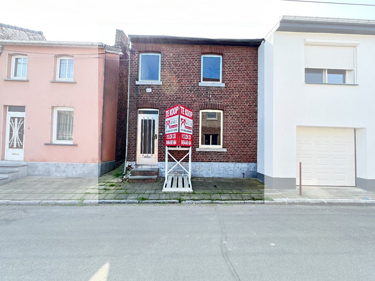 Te renoveren woning met 2 slaapkamers in Tongeren, bouwjaar 1918, met zonnige tuin op het zuidoosten foto 1