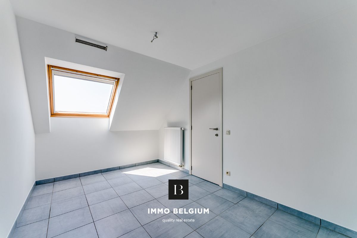 Ruim duplex appartement met 3 slaapkamers foto 11