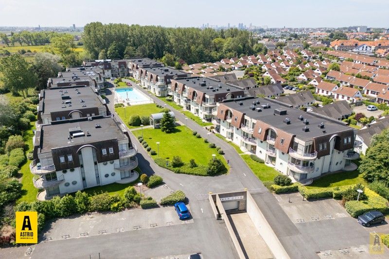 Mooi gelijkvloers vakantie-appartement in groen domein met zwembad! foto 16