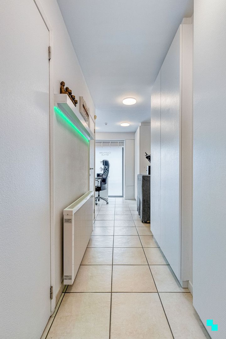Woning met uitbreidingsmogelijkheden en gezellige tuin in het hart van Merelbeke foto 11
