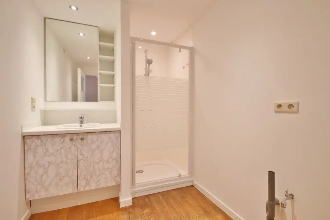 Gunstig gelegen gelijkvloers duplex appartement nabij de Grote Markt foto 14